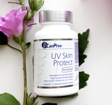 Image of white bottle with blue writing that says UV Skin Protect.
